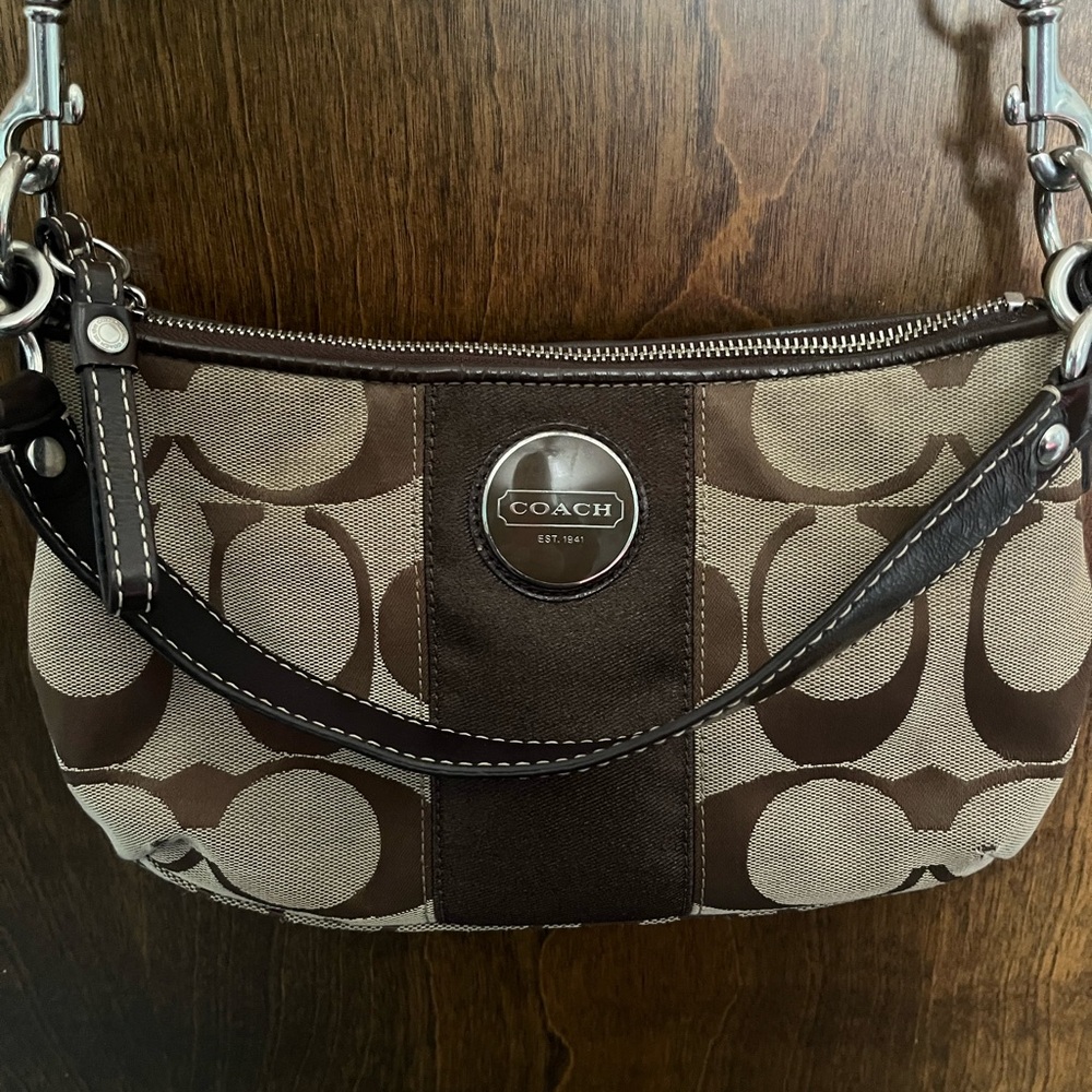 Elegant Brown and Tan Signature Shoulder Bag with Monogram Pattern